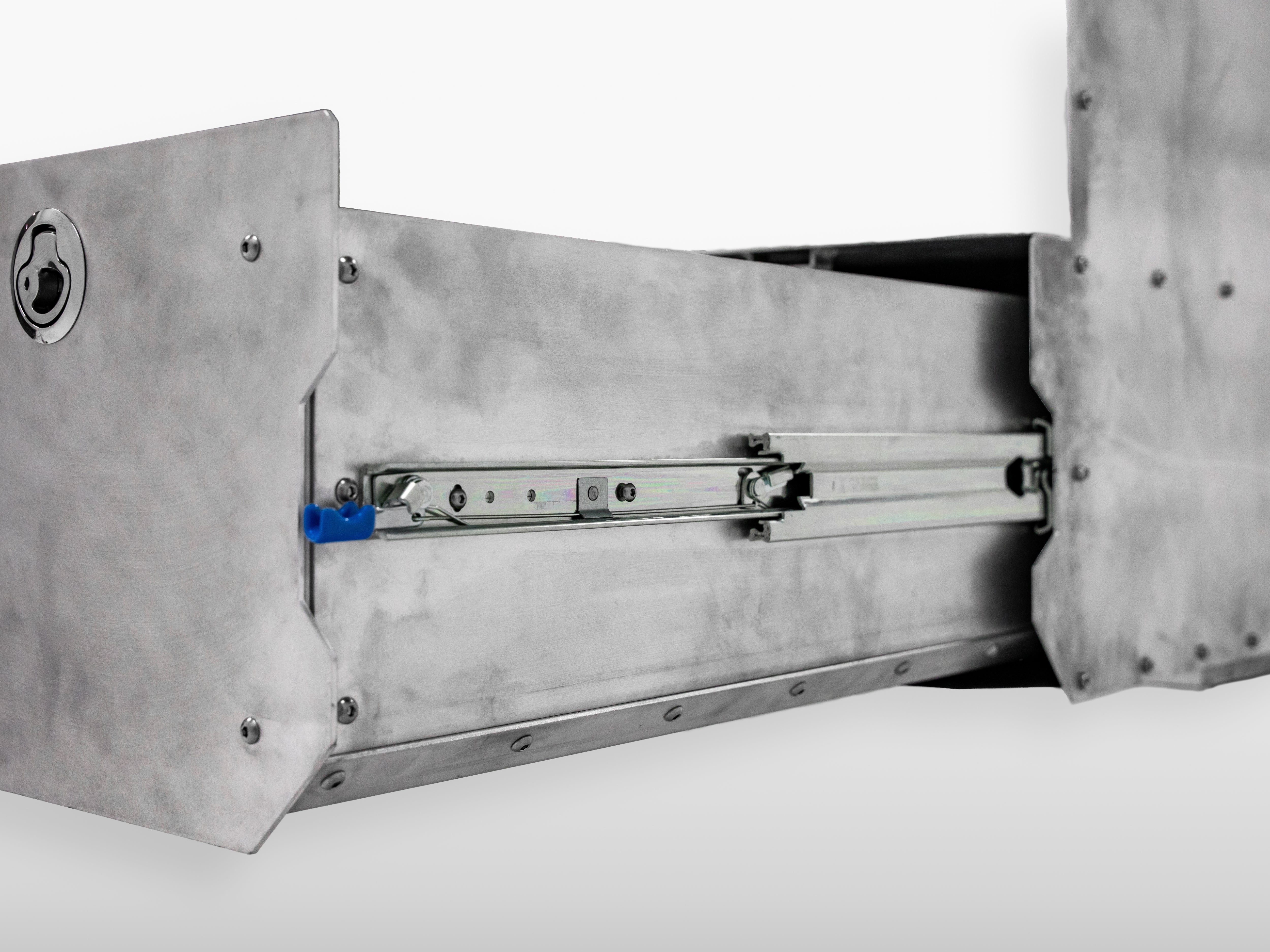 Drawer mechanism of The Highway Tight aluminum seat delete system showing smooth slide track.