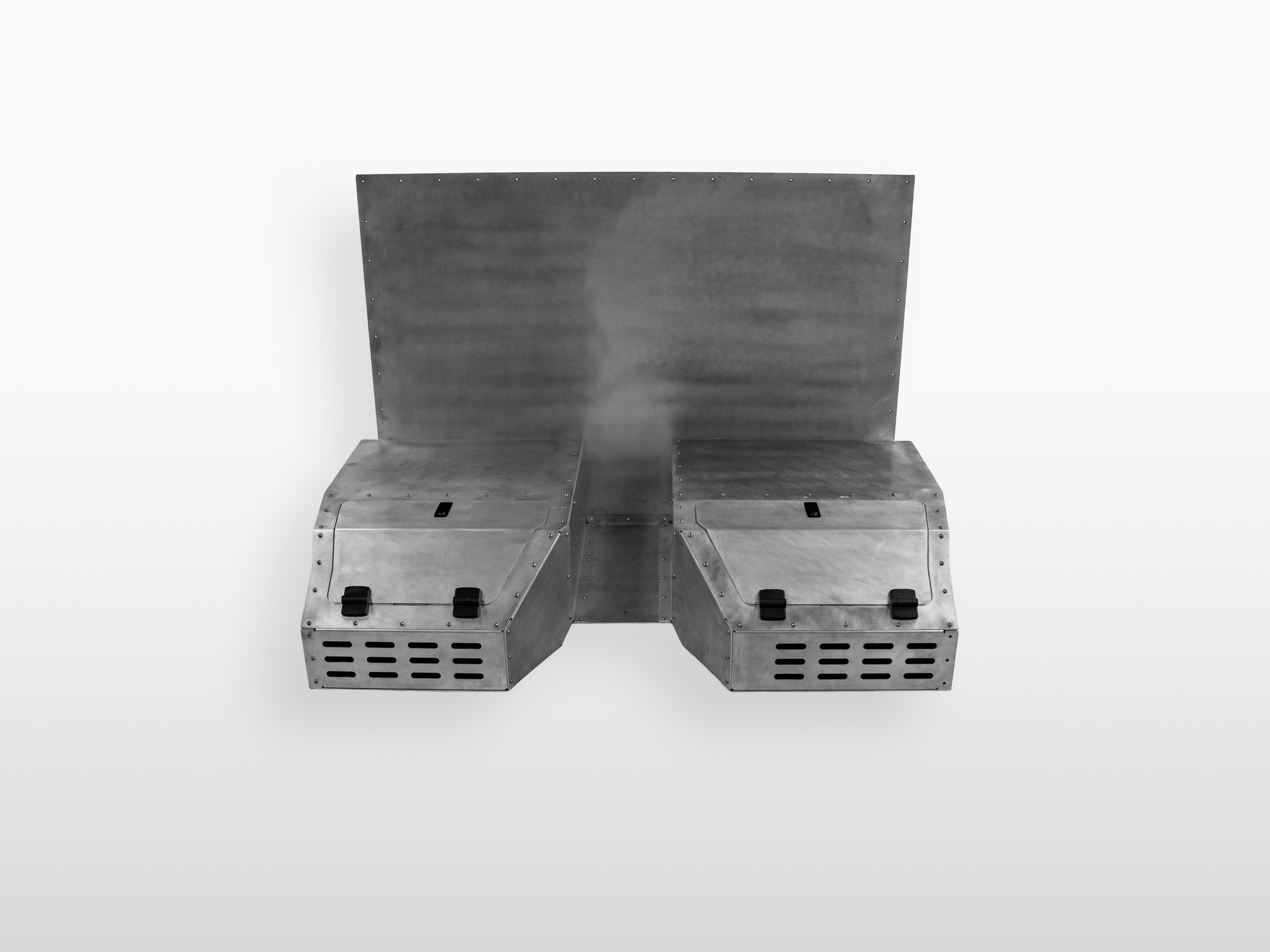 Front angled view of The Highway Tight aluminum seat delete system with dual storage compartments.