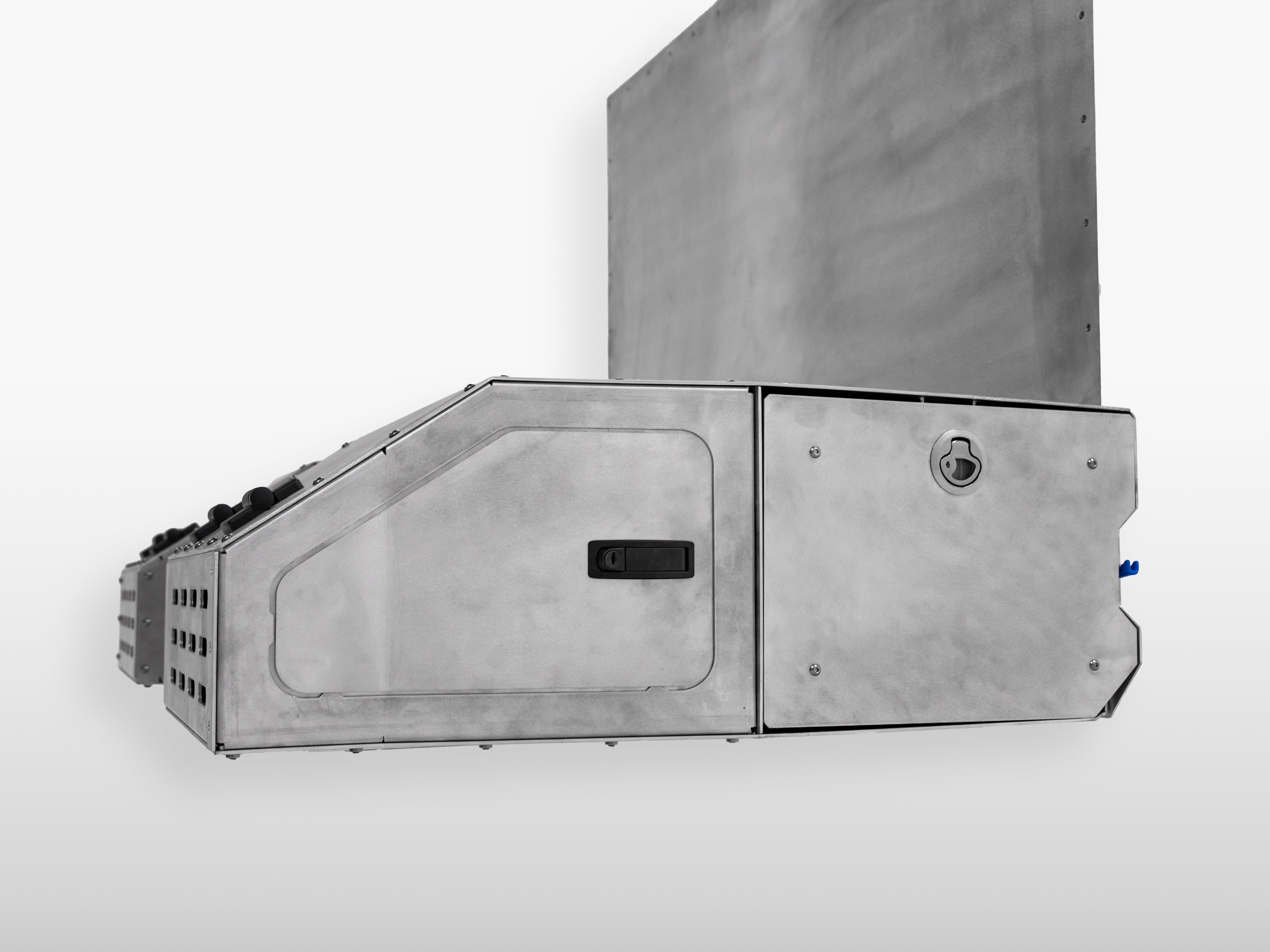 Side view of The Highway Tight aluminum seat delete module showing keyed lock system.