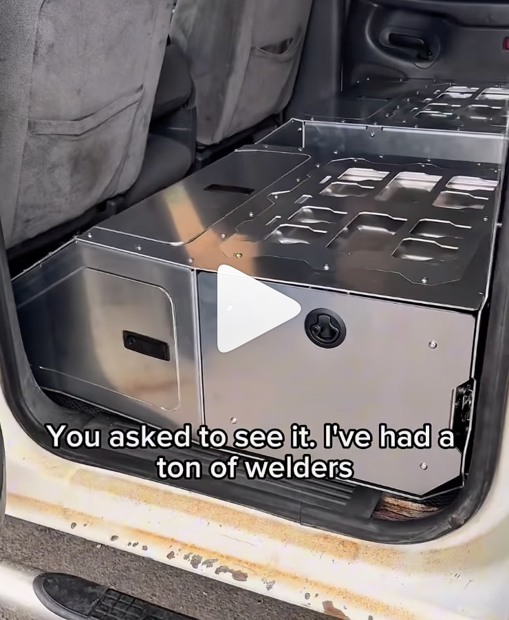 Metal toolbox in a car trunk with text overlay