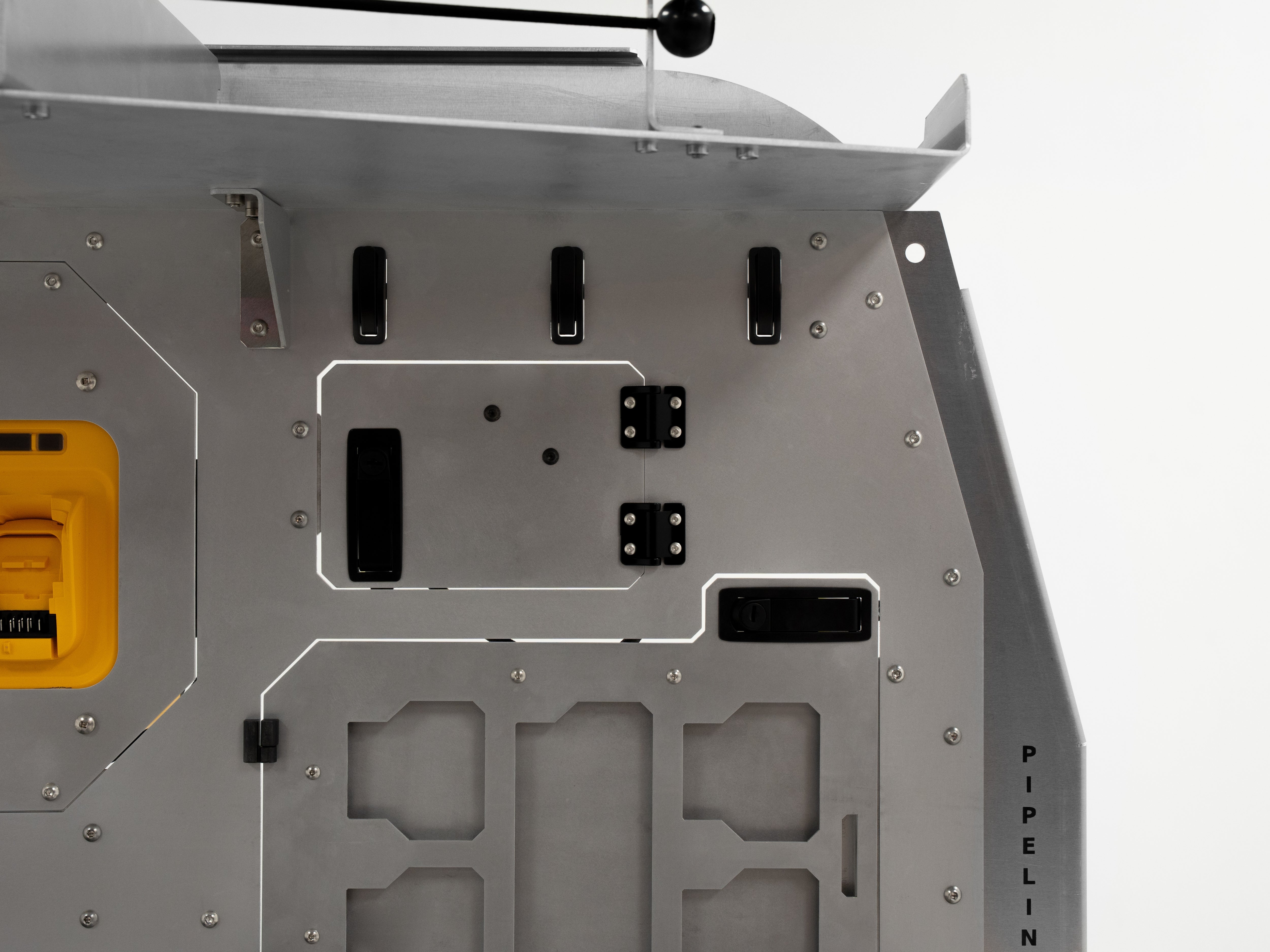 Side panel of The Pipeliner Special featuring mounted hose reel and power connection ports.