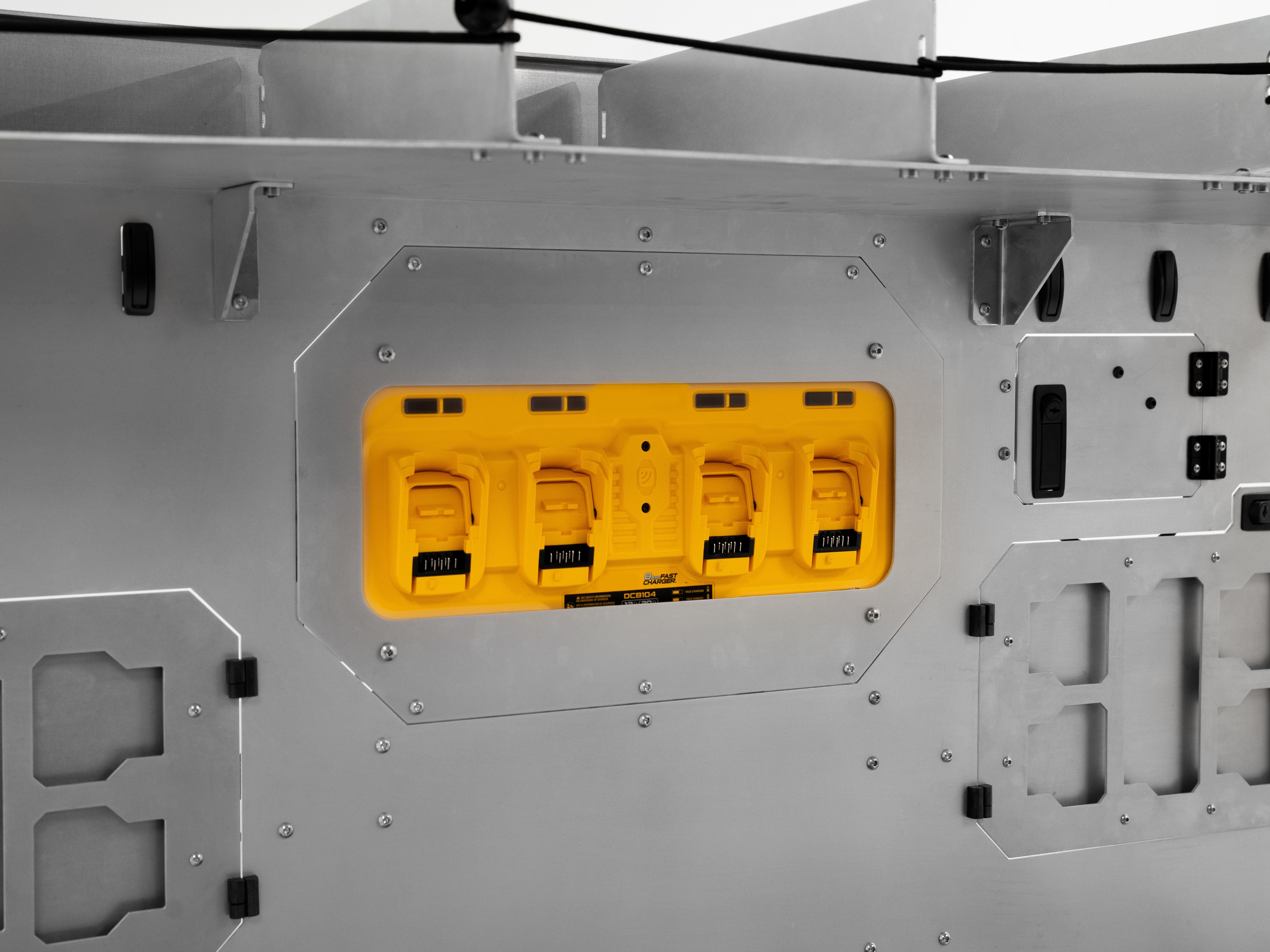 Side angle of The Pipeliner Special showing integrated yellow outlet panel and sturdy aluminum design.