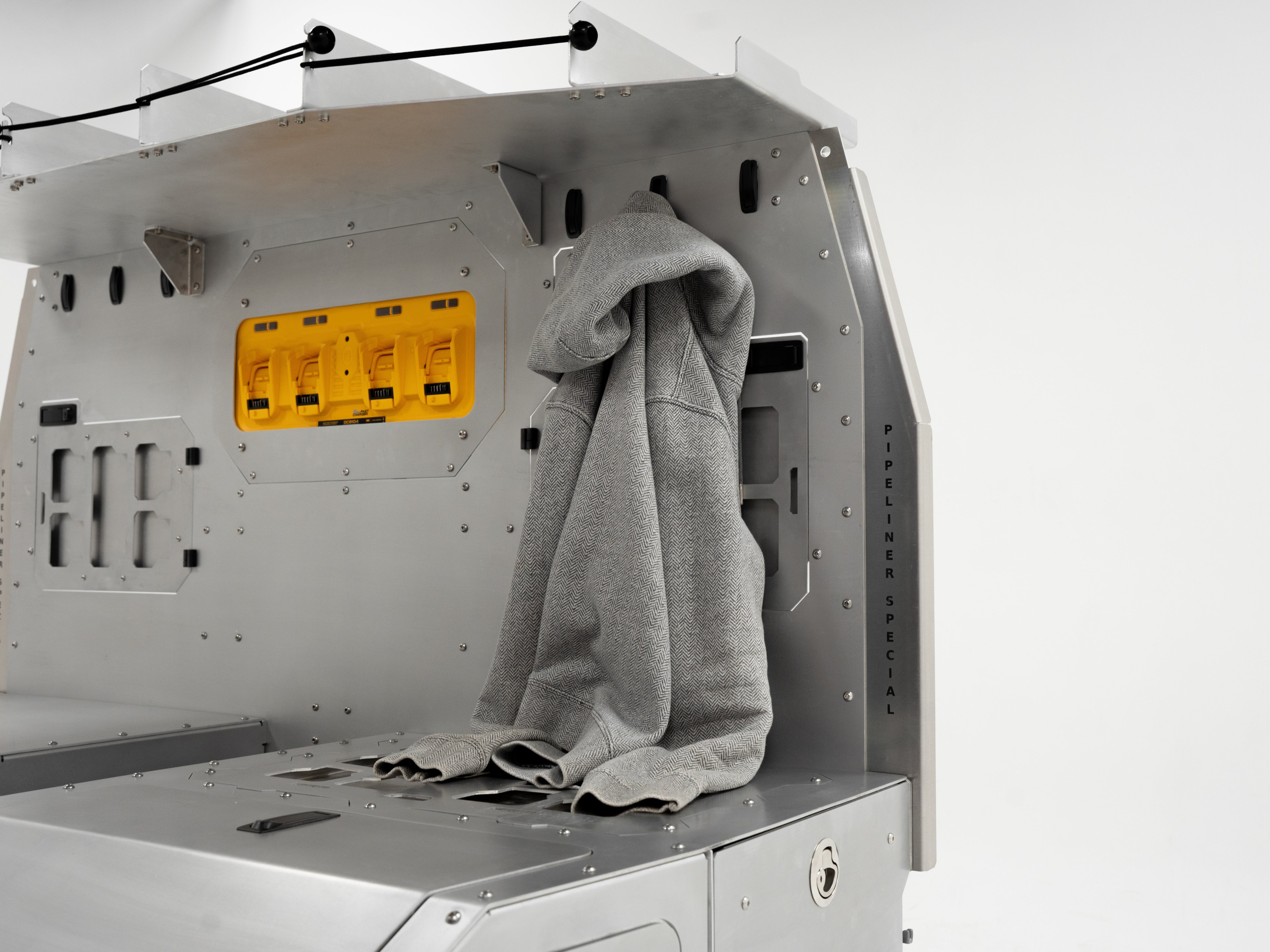 The Pipeliner Special setup with jacket on side rail—built for long field shifts and remote work comfort.